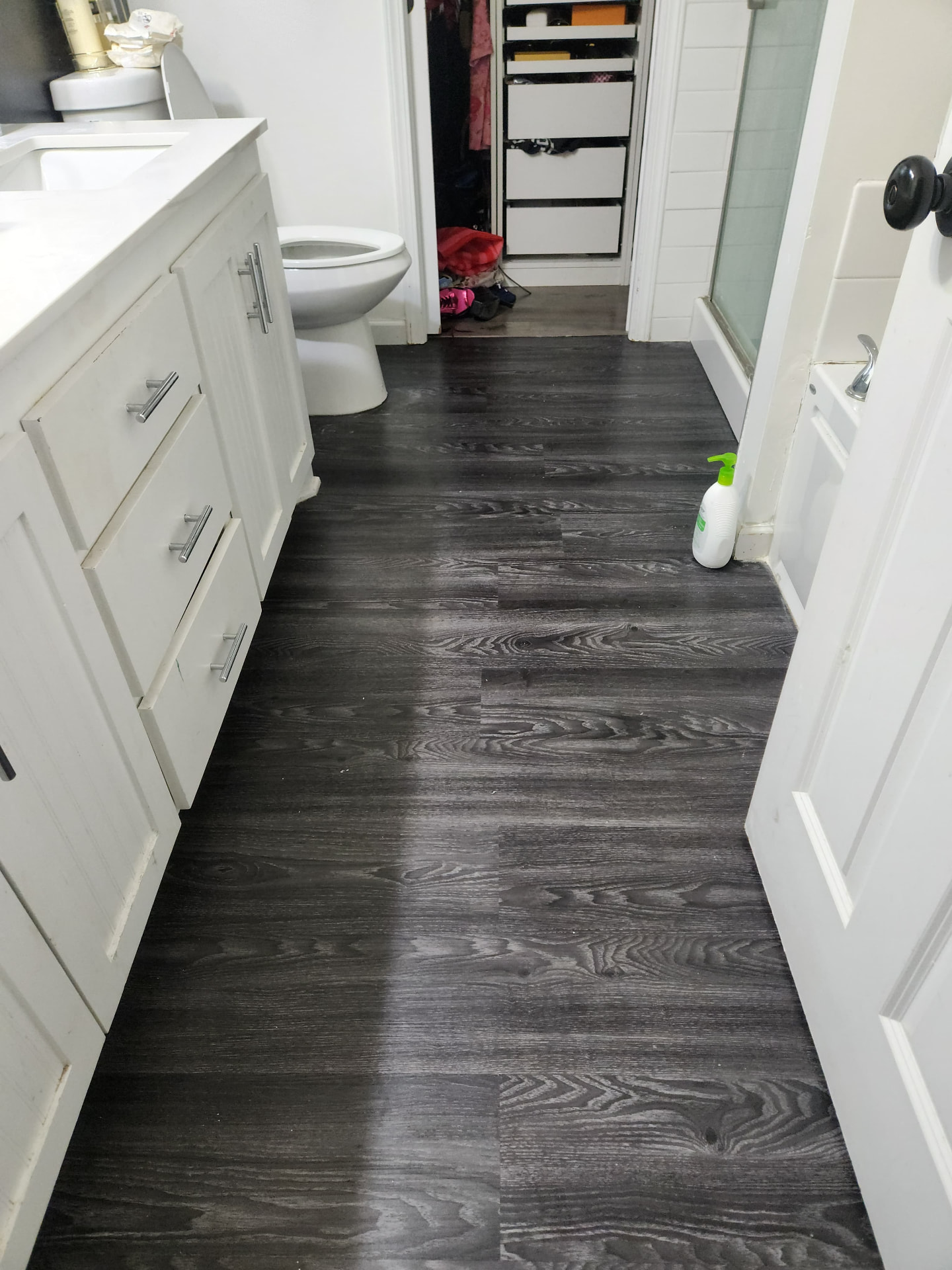 Remodeled bathroom with new non-slip plank flooring
